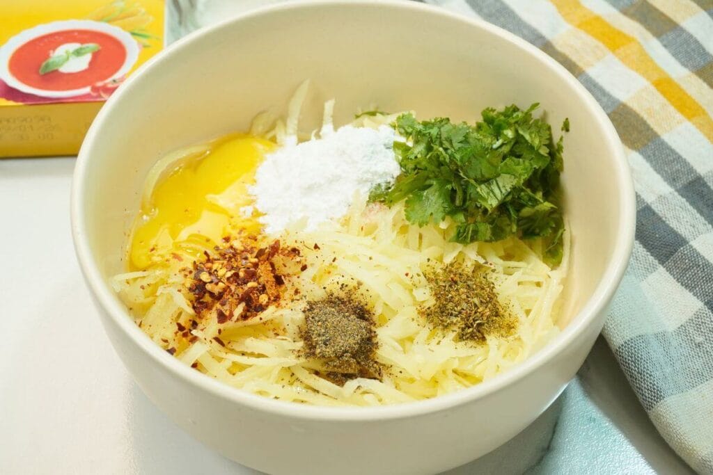 air fryer potato egg snacks all spices added in mixing bowl